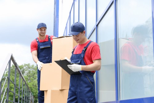 Professional piano relocation preparation inside a Haringey building