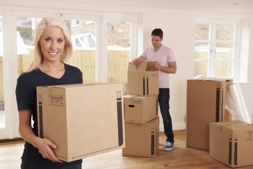 Office relocation preparation in Haringey with desks and moving supplies